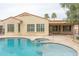 Backyard pool and spa adjacent to covered patio area at 13417 W La Vina Dr, Sun City West, AZ 85375