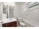 Bright bathroom with a modern vanity, toilet, and tiled shower-tub combination at 13803 W Calle De Baca --, Peoria, AZ 85383