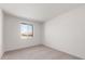 A naturally lit, spacious bedroom featuring neutral carpet at 13803 W Calle De Baca --, Peoria, AZ 85383