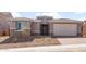 Charming single-Gathering home featuring stone accents, neutral color palette, and a two-car garage at 13803 W Calle De Baca --, Peoria, AZ 85383