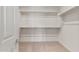 This walk-in closet has multiple shelves for optimal storage at 13803 W Calle De Baca --, Peoria, AZ 85383
