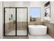 Modern bathroom features a glass-enclosed shower and soaking tub under a window for natural light at 17434 W Via Dona Rd, Surprise, AZ 85387