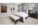 Relaxing bedroom with neutral tones, stylish furnishings, and lots of natural light at 17450 W Via Dona Rd, Surprise, AZ 85387