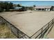 Aerial view of a large horse arena on the property, including a shelter at 18637 E Flintlock Dr, Queen Creek, AZ 85142