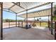 Well-maintained horse shelter with concrete flooring, ample space, and secure fencing at 18637 E Flintlock Dr, Queen Creek, AZ 85142