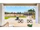 View of an attractive backyard including a horse paddock from covered patio at 18637 E Flintlock Dr, Queen Creek, AZ 85142