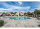 Community pool and spa with surrounding lounge chairs in a well-maintained environment at 1941 W Yellowstone Way, Chandler, AZ 85248