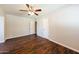 Bedroom featuring wood-look flooring and a ceiling fan for comfortable living at 2027 W Monte Vista Rd, Phoenix, AZ 85009