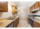 Charming kitchen featuring wood cabinetry and standard appliances at 2104 W Yukon Dr, Phoenix, AZ 85027