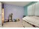 Bright bedroom showcasing heart-themed decor and plush furniture, creating a whimsical and comfortable retreat at 21407 W Hubbell St, Buckeye, AZ 85396