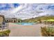 Sienna Hills community pool features mountain views, picnic tables, lounge chairs and a splash pad for Gathering fun at 21407 W Hubbell St, Buckeye, AZ 85396