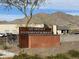 The Odyssey Preparatory Academy school sign is a modern, rustic design with beautiful views of the nearby mountains at 21407 W Hubbell St, Buckeye, AZ 85396