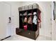 Mudroom with a storage bench, cubbies, and gray baskets for organizing essentials at 21407 W Hubbell St, Buckeye, AZ 85396