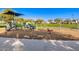 Playground featuring swings, a slide, and a horse ride at 21407 W Hubbell St, Buckeye, AZ 85396