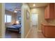 Hallway leading to a bedroom and laundry room at 21857 N Gibson Dr, Maricopa, AZ 85139