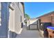 Side yard with storage shed, perfect for additional outdoor storage and functionality at 21857 N Gibson Dr, Maricopa, AZ 85139