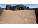 Good-sized dirt backyard with covered patio at 22961 E Twin Acres Dr, Queen Creek, AZ 85142