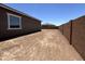 Good-sized dirt backyard with block wall at 22961 E Twin Acres Dr, Queen Creek, AZ 85142