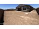 Good-sized dirt backyard with covered patio at 22961 E Twin Acres Dr, Queen Creek, AZ 85142
