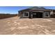 Good-sized dirt backyard with covered patio at 22961 E Twin Acres Dr, Queen Creek, AZ 85142