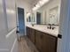 Spacious bathroom featuring double sinks, ample counter space, and stylish fixtures at 22961 E Twin Acres Dr, Queen Creek, AZ 85142