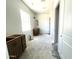 Bathroom featuring brown vanities, a window, and modern design elements at 22961 E Twin Acres Dr, Queen Creek, AZ 85142
