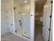 Modern bathroom with sleek glass shower, stylish fixtures, and ample natural light at 22961 E Twin Acres Dr, Queen Creek, AZ 85142