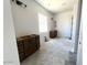 Bathroom features a double vanity with dark wood cabinets at 22961 E Twin Acres Dr, Queen Creek, AZ 85142