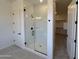 Modern bathroom with sleek glass shower, stylish fixtures, and ample natural light at 22961 E Twin Acres Dr, Queen Creek, AZ 85142