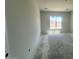 Bright bedroom with natural light coming in through a large window at 22961 E Twin Acres Dr, Queen Creek, AZ 85142