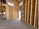 Wood framing with installed windows and concrete floor at 22961 E Twin Acres Dr, Queen Creek, AZ 85142