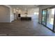 Open floorplan with eat-in kitchen featuring a large island, stainless appliances and tile backsplash at 22961 E Twin Acres Dr, Queen Creek, AZ 85142