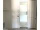Empty laundry room awaiting finishing touches, featuring shelving support and dryer vent at 22961 E Twin Acres Dr, Queen Creek, AZ 85142