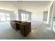 Spacious living area with plenty of natural light and access to the kitchen at 22961 E Twin Acres Dr, Queen Creek, AZ 85142