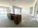 Open-concept living room with sliding glass doors and plenty of natural light at 22961 E Twin Acres Dr, Queen Creek, AZ 85142