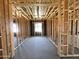 Spacious unfinished room featuring wood framing, offering a customizable living space at 22961 E Twin Acres Dr, Queen Creek, AZ 85142