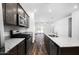 Well-equipped kitchen with stainless steel appliances and a spacious granite countertop island at 24577 W St Anne Ave, Buckeye, AZ 85326