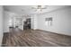 Bright and open living space featuring modern wood-look flooring at 24577 W St Anne Ave, Buckeye, AZ 85326