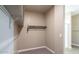 Spacious walk-in closet featuring shelving for optimal storage solutions in this home at 2480 S 241St Ave, Buckeye, AZ 85326