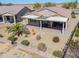Spacious backyard featuring a covered patio, desert landscaping, and privacy wall at 2643 E San Ricardo Trl, Casa Grande, AZ 85194