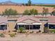 Home featuring a covered patio, desert landscaping, and outdoor privacy at 2643 E San Ricardo Trl, Casa Grande, AZ 85194