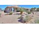 A covered back patio with pavers is adjacent to desert landscaping at 2643 E San Ricardo Trl, Casa Grande, AZ 85194