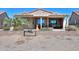 View of a covered back patio with pavers, with a low brick wall and a desert landscape at 2643 E San Ricardo Trl, Casa Grande, AZ 85194