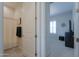 Bathroom and bedroom feature neutral walls and carpet with bright, natural light at 2643 E San Ricardo Trl, Casa Grande, AZ 85194