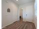 Inviting entryway boasts luxury vinyl plank floors and access to other rooms at 2643 E San Ricardo Trl, Casa Grande, AZ 85194