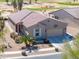Charming single-story home with desert landscaping, tile roof, and attached two-car garage near the golf course at 2643 E San Ricardo Trl, Casa Grande, AZ 85194