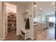 Walk-in pantry with generous shelving provides ample storage off the kitchen at 2643 E San Ricardo Trl, Casa Grande, AZ 85194