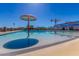 Enjoy the community pool with splash pad and shade for those hot days at 2725 W Silver Creek Ln, San Tan Valley, AZ 85144