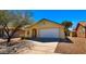 Charming single-Gathering home featuring a two-car garage, mature tree, and well-maintained landscaping at 2725 W Silver Creek Ln, San Tan Valley, AZ 85144