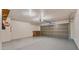 Spacious garage with painted floor, and a new garage door with automatic opener at 2725 W Silver Creek Ln, San Tan Valley, AZ 85144